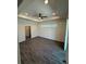 Bright bedroom with tile floors, recessed lighting, and a large window at 12051 Crossgate Ave, Port Charlotte, FL 33981