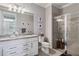 Double vanity, granite countertop, and large walk-in shower at 12750 Oriago St, Venice, FL 34293