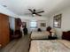 Bedroom with two beds, ceiling fan, closet, and small window at 1438 Razorbill Ln, Punta Gorda, FL 33983