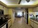 View of the kitchen leading into the dining area at 1438 Razorbill Ln, Punta Gorda, FL 33983