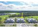 Aerial view of a townhome community with golf course views at 14672 Sycamore Ct # 3622, Punta Gorda, FL 33955