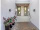 Townhome entry with double doors and brick pavers at 14672 Sycamore Ct # 3622, Punta Gorda, FL 33955
