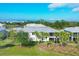 Rear view of a light gray building, featuring a golf course view at 14672 Sycamore Ct # 3622, Punta Gorda, FL 33955