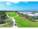 Golf course with players and golf carts visible at 14672 Sycamore Ct # 3622, Punta Gorda, FL 33955