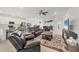 Open-concept living room with kitchen and dining area visible at 14672 Sycamore Ct # 3622, Punta Gorda, FL 33955