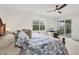 Main bedroom with king bed, private access to balcony and workspace at 14672 Sycamore Ct # 3622, Punta Gorda, FL 33955