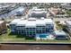 Community pool and spa with condos and waterfront view at 1600 W Marion Ave # 234, Punta Gorda, FL 33950