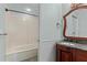 View of a bathroom with a tub, vanity, and tiled floor at 1600 W Marion Ave # 234, Punta Gorda, FL 33950