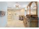 Elegant bathroom featuring ornate vanity, large mirror, and glass-enclosed shower at 1600 W Marion Ave # 234, Punta Gorda, FL 33950