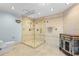 Modern bathroom with glass shower, tile walls, and upgraded fixtures at 1600 W Marion Ave # 234, Punta Gorda, FL 33950