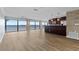 Open living room and kitchen area with water views at 1600 W Marion Ave # 234, Punta Gorda, FL 33950