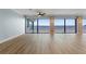 Spacious living room with large windows offering stunning water views at 1600 W Marion Ave # 234, Punta Gorda, FL 33950