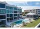 Private pool and screened-in patio area with water views at 1600 W Marion Ave # 234, Punta Gorda, FL 33950