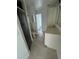 Clean bathroom with shower, toilet, and vanity at 200 Dolphin Pkwy, Punta Gorda, FL 33950