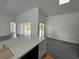Bright, open kitchen and dining area with sliding glass doors leading to the patio at 200 Dolphin Pkwy, Punta Gorda, FL 33950