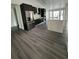 Modern kitchen boasts stainless steel appliances, a sleek island, and ample counter space at 200 Dolphin Pkwy, Punta Gorda, FL 33950
