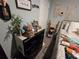 Bedroom with dresser, wall decor and a rustic ladder shelf at 2201 Grand Flora Trl, Bradenton, FL 34208