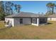 Single Gathering home with a screened patio at 2364 Hagerick Ln, North Port, FL 34288