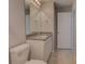 Clean bathroom with granite countertop and a toilet at 2364 Hagerick Ln, North Port, FL 34288