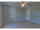 Spacious bedroom with tile flooring and ceiling fan at 2364 Hagerick Ln, North Port, FL 34288