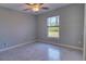 Simple bedroom with tile floors and a window at 2364 Hagerick Ln, North Port, FL 34288