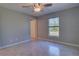 Bright bedroom with tile floors and large window at 2364 Hagerick Ln, North Port, FL 34288