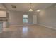 Dining area with tile floor and view to the kitchen at 2364 Hagerick Ln, North Port, FL 34288