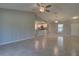 Bright, open living space with tile floors, flowing into the kitchen, perfect for modern living at 2364 Hagerick Ln, North Port, FL 34288
