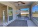Relaxing screened porch with backyard view at 2364 Hagerick Ln, North Port, FL 34288