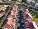 Aerial view of Magdalena Gardens community, showcasing building exteriors and landscaping at 240 W End Dr # 311, Punta Gorda, FL 33950