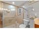 Bathroom with walk-in shower and neutral tile at 240 W End Dr # 311, Punta Gorda, FL 33950