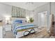 Spacious bedroom with king bed and calming blue bedding at 240 W End Dr # 311, Punta Gorda, FL 33950
