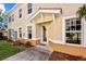 Townhouse entryway with walkway and landscaping at 240 W End Dr # 311, Punta Gorda, FL 33950
