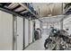Garage with overhead storage and epoxy floor at 240 W End Dr # 311, Punta Gorda, FL 33950