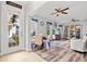 Bright and spacious living area with wood-look floors and a Christmas tree at 240 W End Dr # 311, Punta Gorda, FL 33950