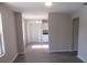 View of the living room with hardwood floors leading to the pantry and kitchen at 2410 Lanier Rd, Punta Gorda, FL 33982