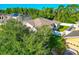 Home with solar panels, fenced backyard, and large green lawn at 2507 Hobblebrush Dr, North Port, FL 34289