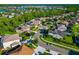 Aerial view of a neighborhood with houses and curved roads at 2507 Hobblebrush Dr, North Port, FL 34289