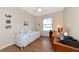 Bedroom with daybed, workspace, and ceiling fan at 2507 Hobblebrush Dr, North Port, FL 34289