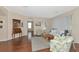 Spacious living room with hardwood floors, ample natural light, and a cozy atmosphere at 2507 Hobblebrush Dr, North Port, FL 34289