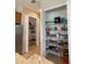 Well-organized pantry with ample shelving for storage at 283 White Marsh Ln, Rotonda West, FL 33947