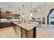 Spacious kitchen with granite island and open floor plan at 31 Tee View Pl, Rotonda West, FL 33947