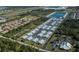 Aerial view showcasing community layout and surrounding landscape at 3300 Loveland Blvd # 3103, Punta Gorda, FL 33980
