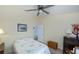 Guest bedroom with a full bed and ceiling fan at 3300 Loveland Blvd # 3103, Punta Gorda, FL 33980
