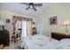Bedroom with a queen bed and sliding glass doors at 3300 Loveland Blvd # 3103, Punta Gorda, FL 33980