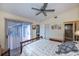Bedroom with sliding door to patio access and ceiling fan at 3300 Loveland Blvd # 3103, Punta Gorda, FL 33980
