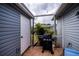 Outdoor patio with a grill and ample space for relaxation at 3300 Loveland Blvd # 3103, Punta Gorda, FL 33980