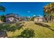 Spacious backyard with a screened-in pool and a shed at 3404 Depew Ave, Port Charlotte, FL 33952