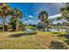Tranquil backyard oasis with a picturesque waterfront view at 3404 Depew Ave, Port Charlotte, FL 33952