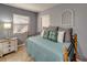 Cozy guest bedroom or secondary bedroom with a daybed and simple furnishings at 3404 Depew Ave, Port Charlotte, FL 33952